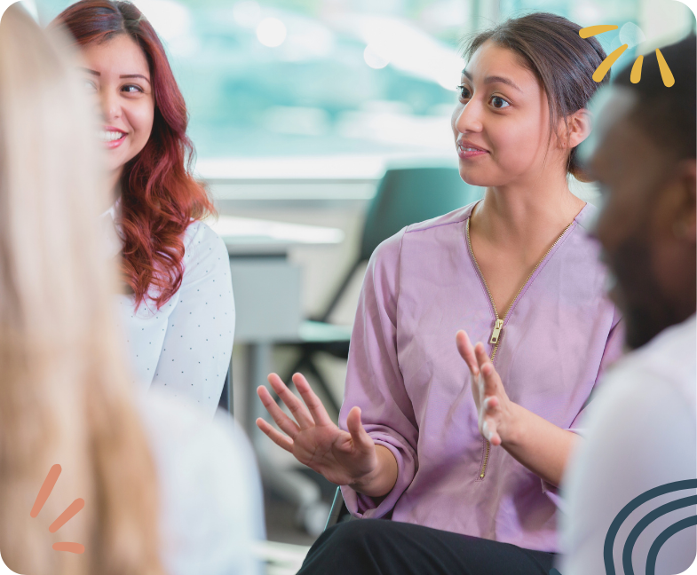 Photo d'un groupe de parole avec une bonne ambiance. Illustration pour la réunion des animateurs de communautés en communication nonviolente.